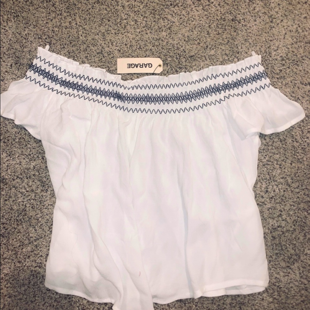 Garage, over the shoulder shirt.